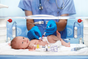 baby in incubator