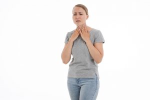 pregnant woman with a sore throat