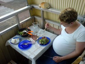 pregnant woman eating
