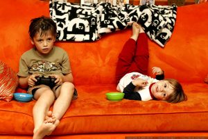 Siblings on the couch