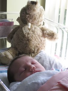 baby with teddy bear