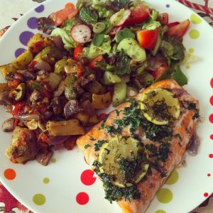 salad and fish with lemon
