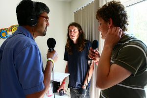 man with interview microphone 