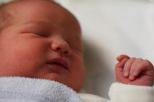 The long-awaited birth was full of scares and surprises. 
